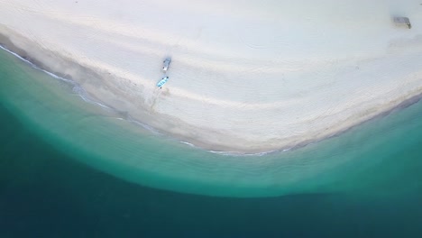 zen - breathtaking ocean landscape with white sand beach, aerial drone overhead
