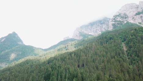 Panning-drone-shot-of-mountains-and-rocky-cliffs-in-the-Alps