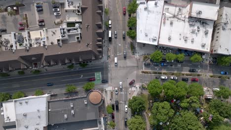 intersection in downtown plymouth, michigan with drone video overhead stable