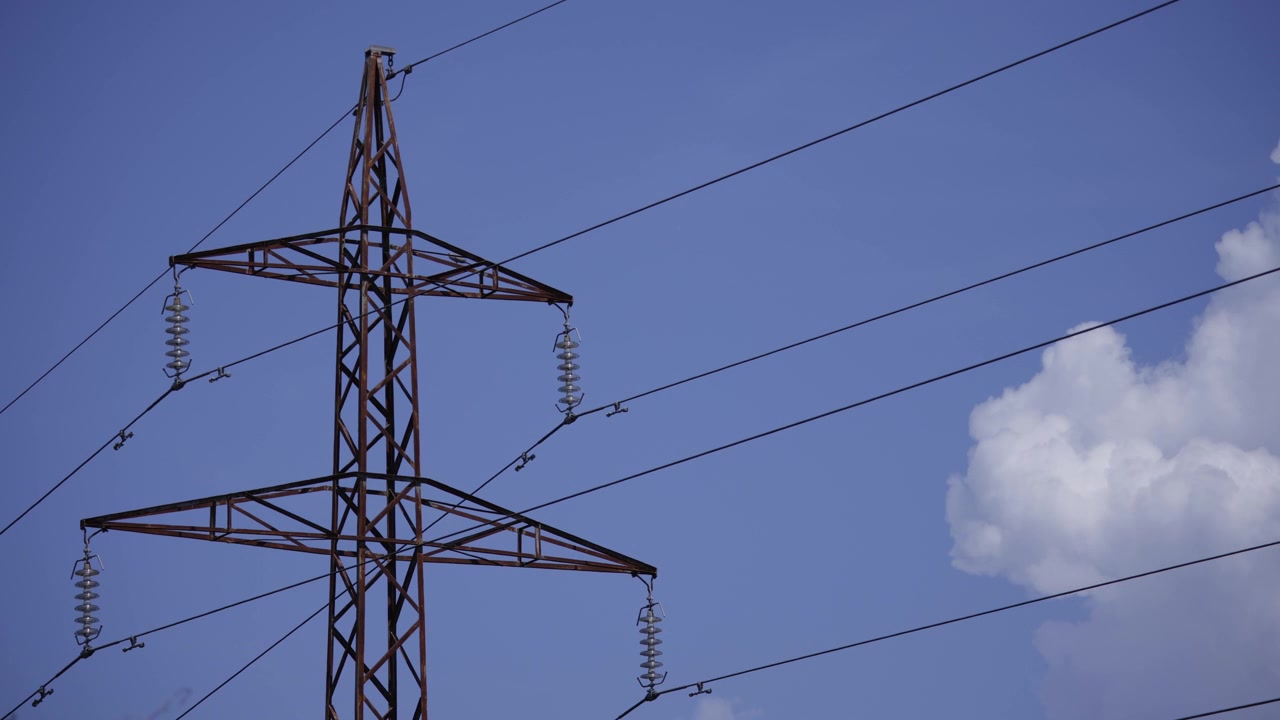 Dark Atmospheric Weather Clouds And Electricity Pylon