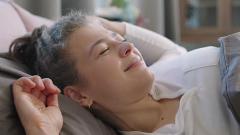 smiling woman waking up in morning