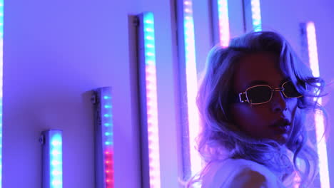 stylish woman in neon lights