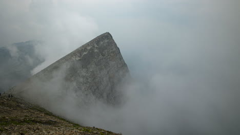 clouds swirl and flow around ha ling peak in this stunning timelapse of the canadian rockies