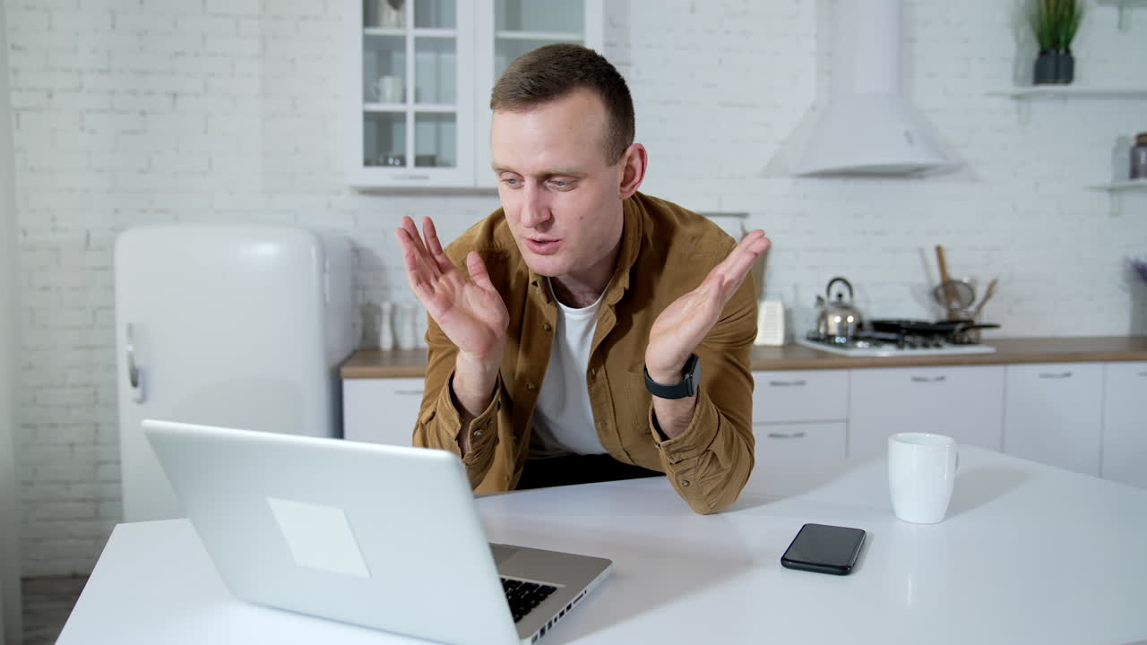 Handsome man have a business conference at home. Quarantine business meeting.