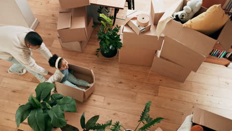 girl, playing and box with father in top view