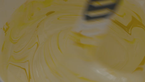 mixing yellow paint