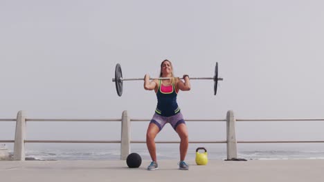 Caucasian-woman-working-out-on-the-docks