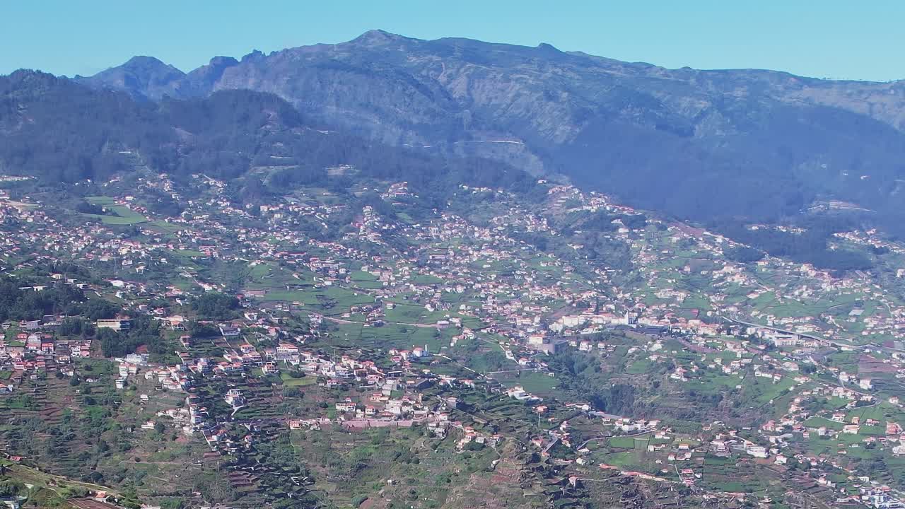 Stunning aerial view of Madeira's lush landscape and city life