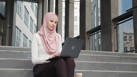 muslim woman working outdoors