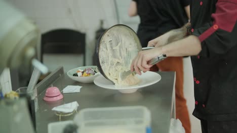 chef in a restaurant preparing food in the kitchen