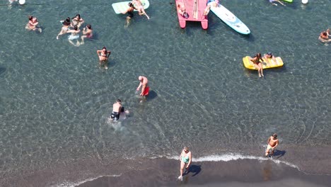 tourists enjoying the beach and water activities