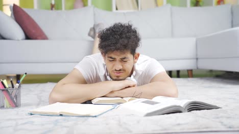 portrait of unhappy and bored male student.