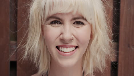 slow motion portrait of happy beautiful caucasian woman smiling