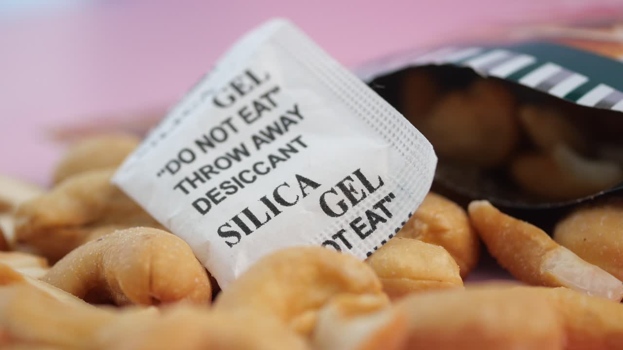 Close-up of Silica Gel Desiccant Packet with Cashew Nuts