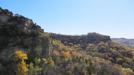 Rocky-mountain-cliff-overlooking-a-forest