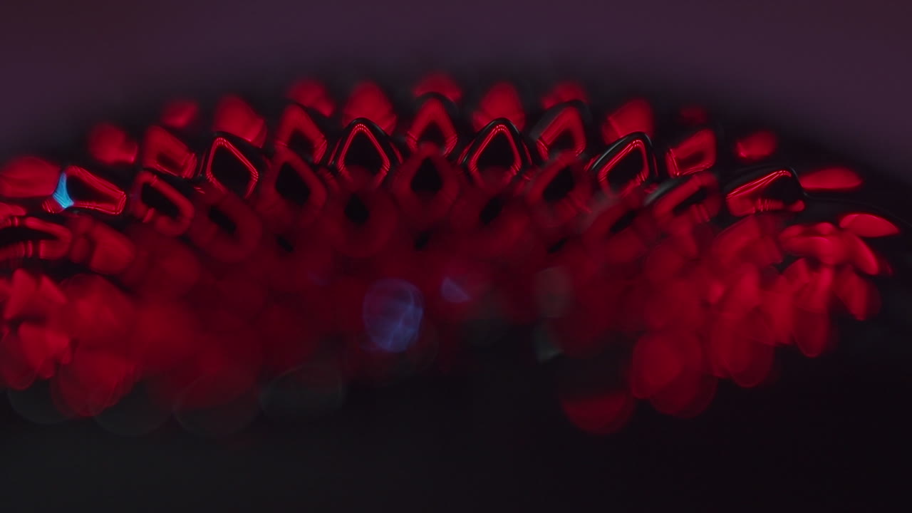 fluid forming spikes in a dark abstract atmosphere