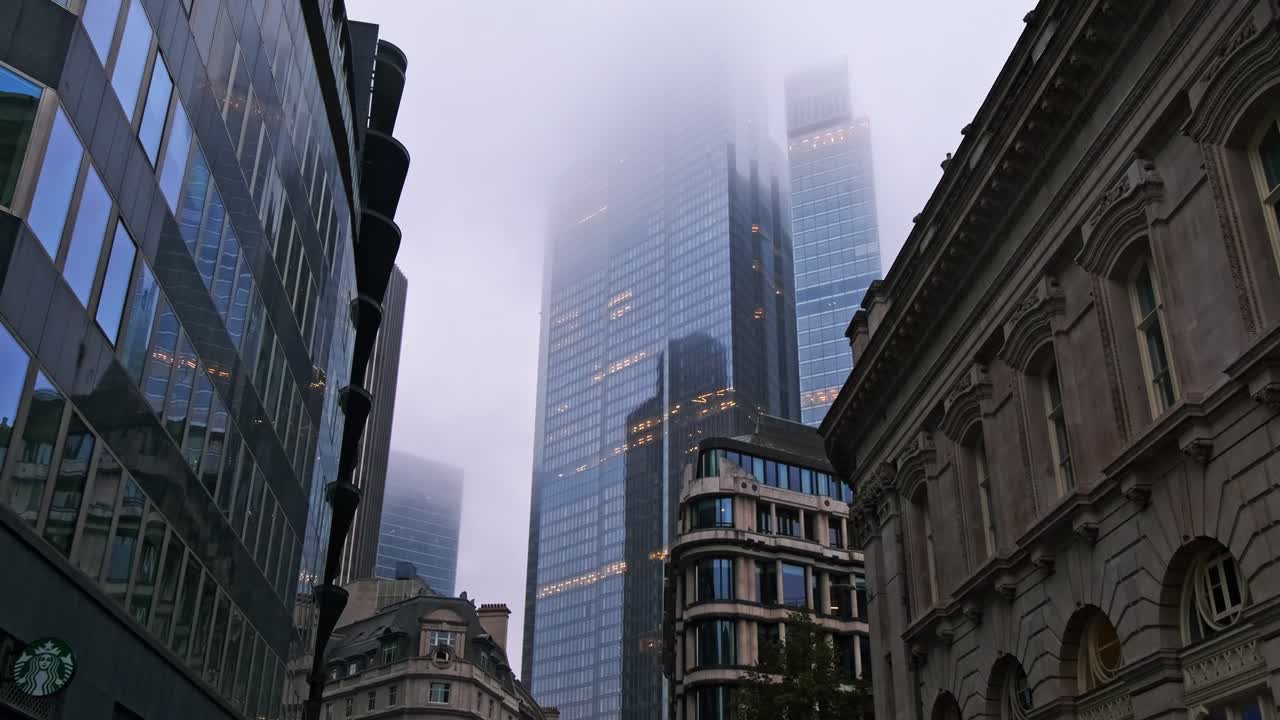 Tilt shot of 22 Bishopsgate, one of the City of Londons newest commercial financial skyscrapers, during a dark cloudy rainy day.