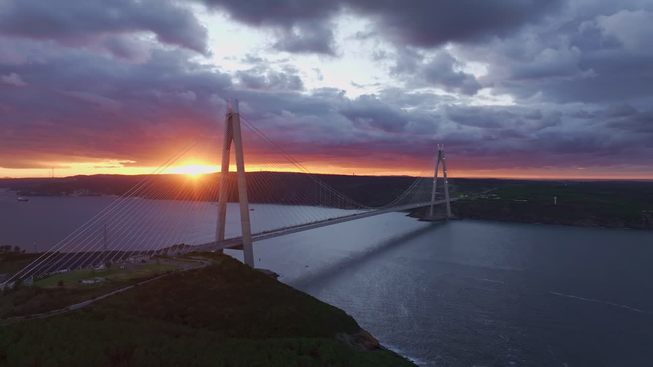 Yavuz Sultan Selim Bridge glowing at sunset in Istanbul's Bosphorus