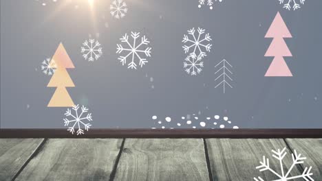 Animation-of-snowflakes-falling-over-christmas-trees-and-pattern-with-wooden-surface