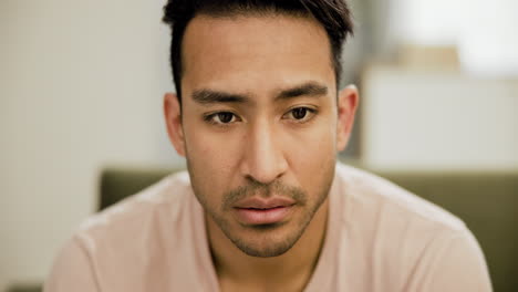 close-up portrait of a man with a serious expression