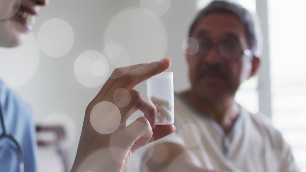 다양한 의사와 환자가 이야기하고 약을 들고 있는 빛의 반점의 애니메이션