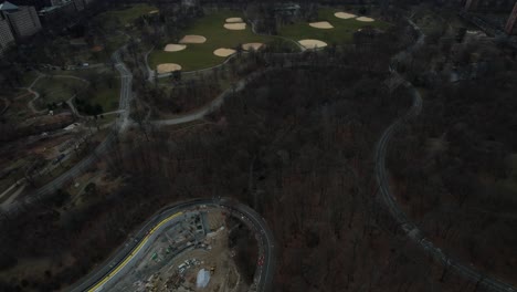 An-aerial-view-over-Central-Park-in-New-York-City-on-a-cloudy-day