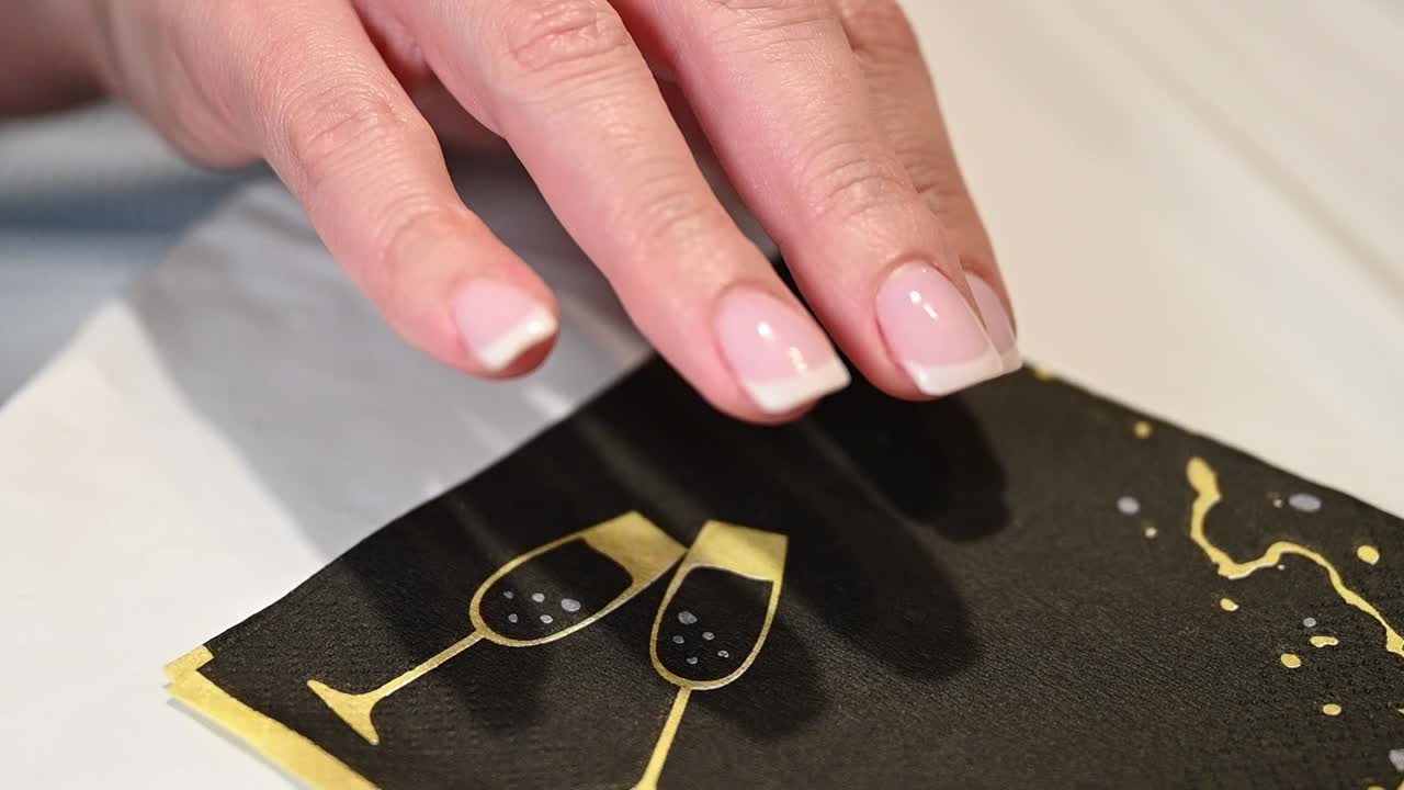 moving fingers that are perfectly manicured in the French style