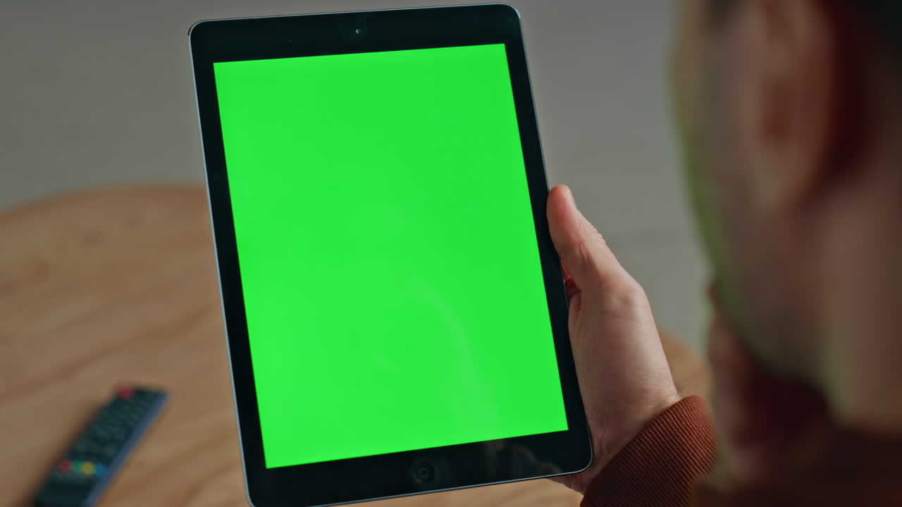 Manager hand holding mockup tablet office closeup. Man reading chroma computer