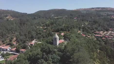 aerial view of a portuguese church in the village of macieira de alcoba, águeda, portugal