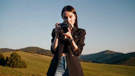 woman with a camera taking photos