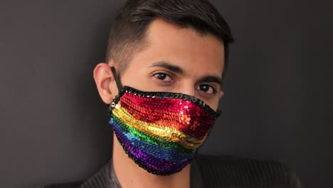 latin - hispanic model wearing an rainbow sequin face mask