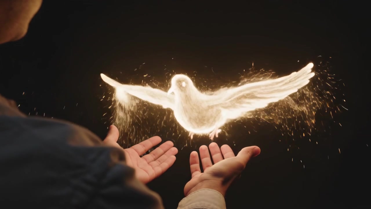 Scia di brace che si forma sopra mani ammanettate, mani che tengono i palmi in un ambiente scuro, uccello che si posa per trovare l'equilibrio