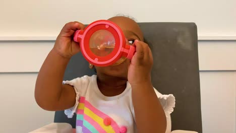 baby eating and drinking her food