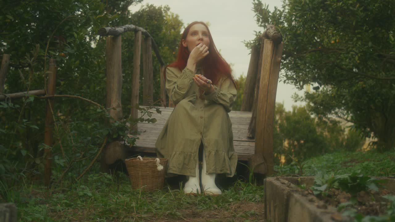 Woman Relaxing in an Orchard