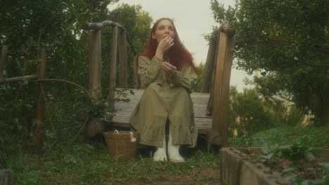 woman relaxing in an orchard