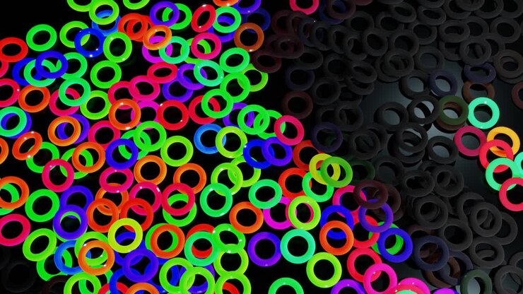 3d abstract looped background with lot of gray toruses or rings lay on plane and light up. Bulbs start to glow forming pattern like abstract chrismas garland. Multicolor waves runs across rings