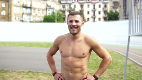 happy athlete in urban park