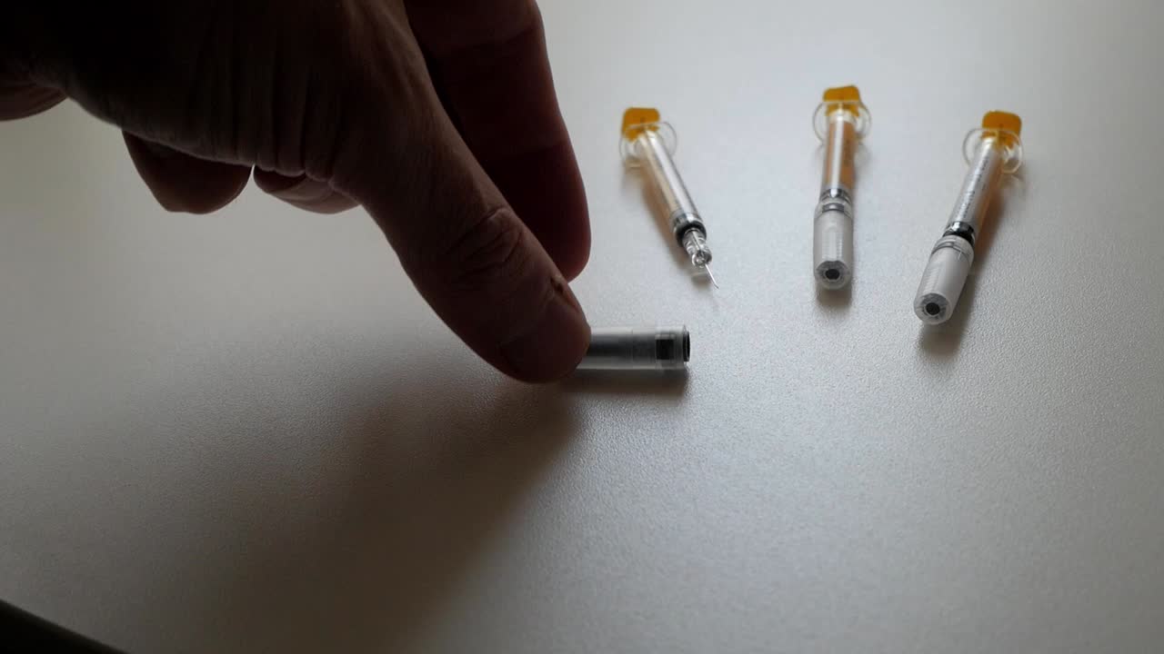 steady shot opening syringes and put it on the table