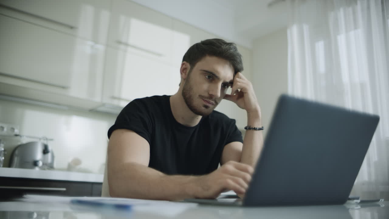Tired businessman have break after working online on computer at home