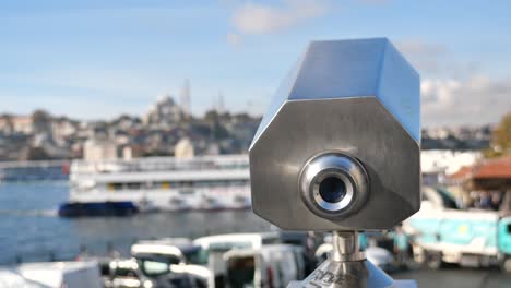 a close-up of binoculars with a view of istanbul