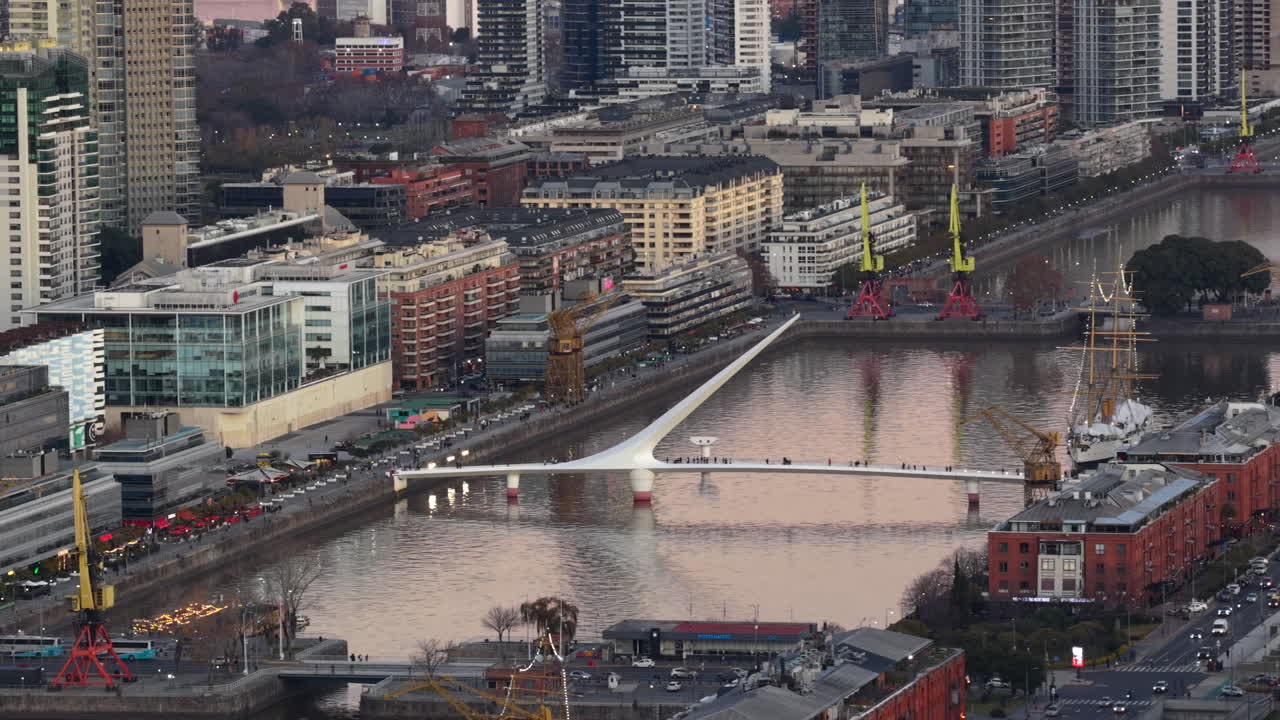 Aerial view about the modern riverside rotating footbridge Puente de la mujer, Buenos Aires, Argentina