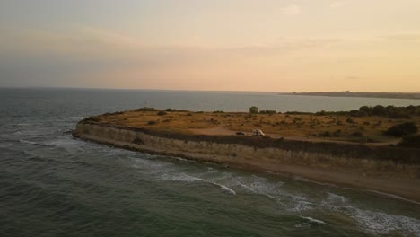 sunset at the beach near the world heritage site of nesebar in bulgaria