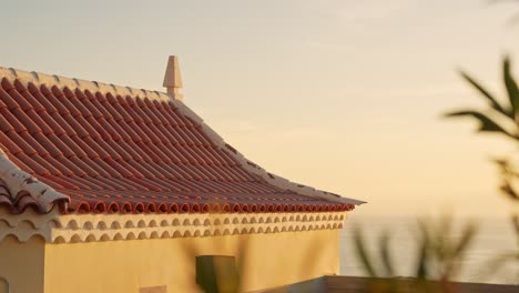 pan left view, traditional spanish house with terracotta red tiles and decorations