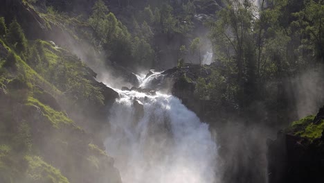 latefossen waterfall odda norway. latefoss is a powerful, twin waterfall.