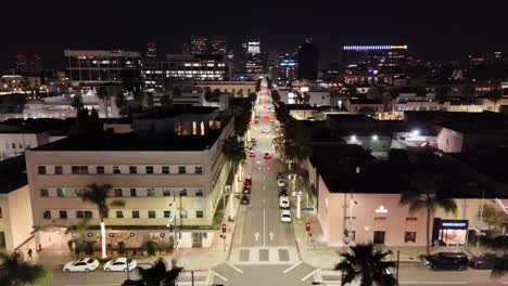 Aerial Night View of Vibrant City Street in Los Angeles Aerial View of a Vibrant City Street at Night in Los Angeles Capturing the Essence of Urban Life with Glowing Lights and Illuminated Buildings all around