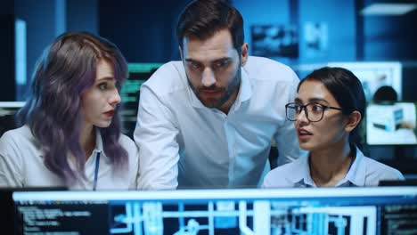 team discussing project at night