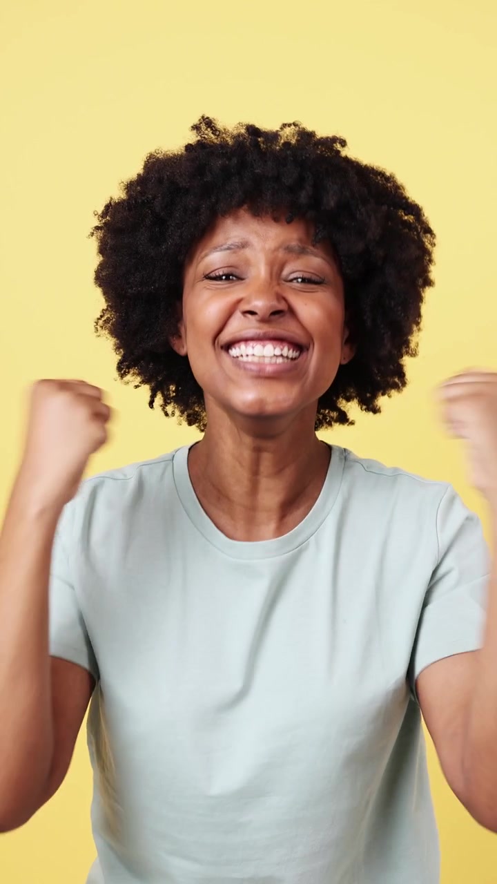 Excited African American Woman Shouting and Celebrating