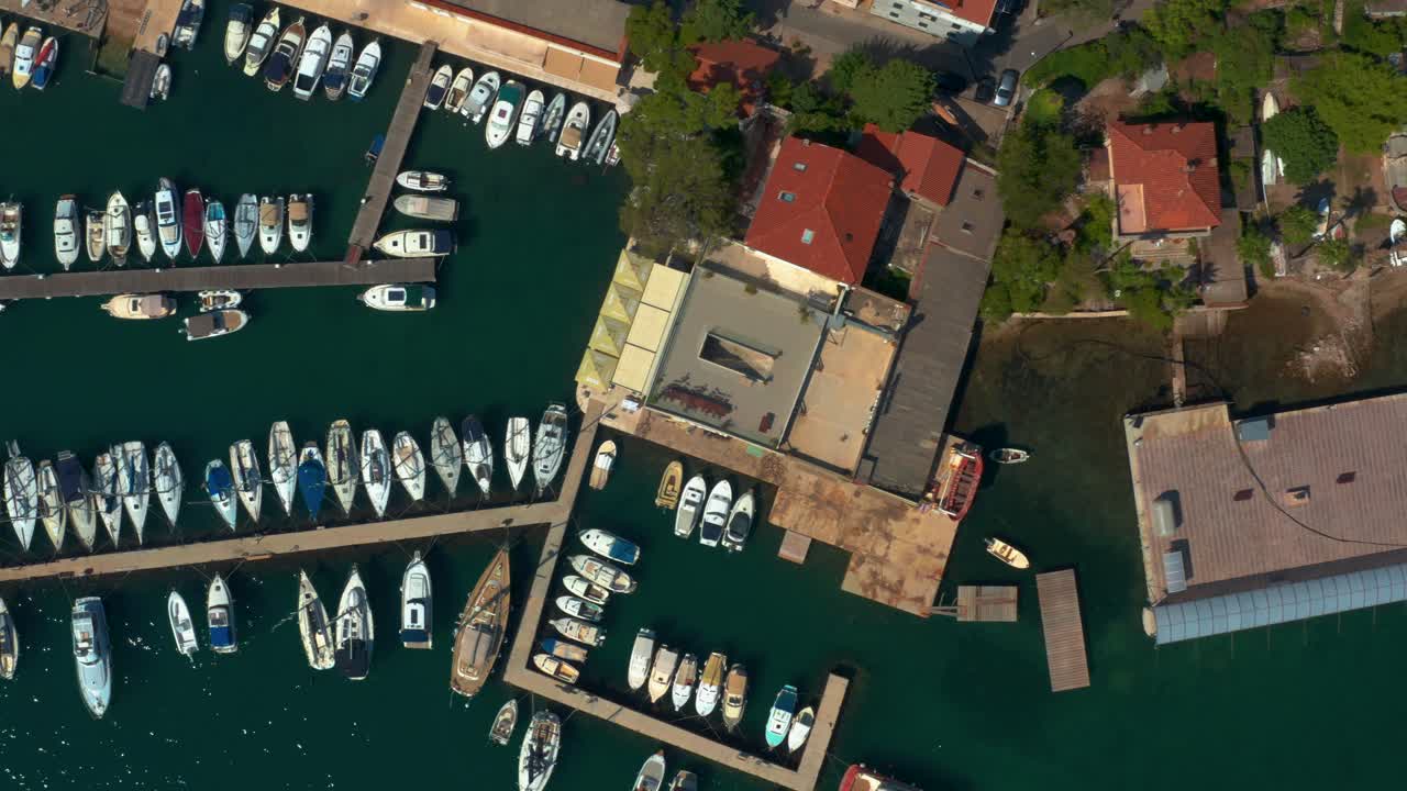 Birds eye view aerial shot of a docking port for small boats in Dubrovnik, Croatia