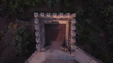 drone flye from castle tower reveals the city