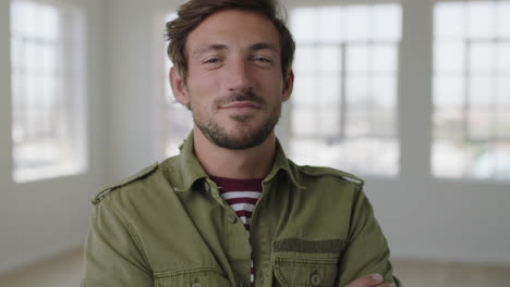 close up portrait of attractive young man smiling confident arms crossed enjoying successful lifestyle change in new apartment